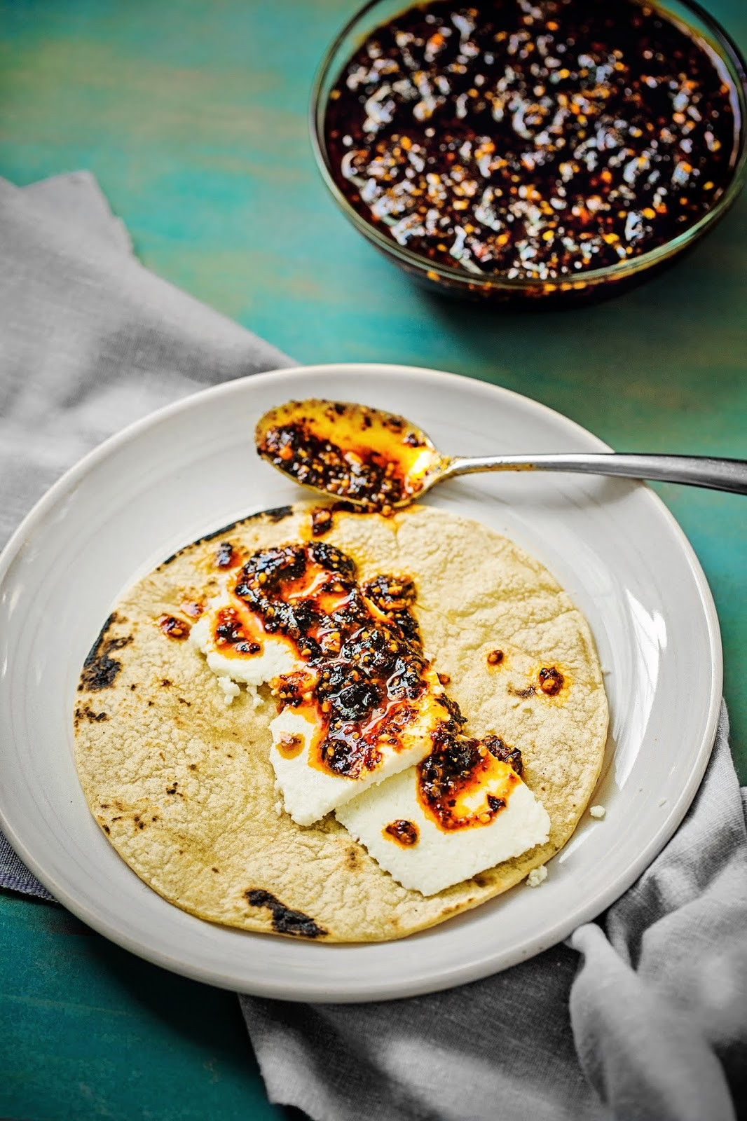 Chili Oil on Taco topped with Chili Oil from Birria Queen